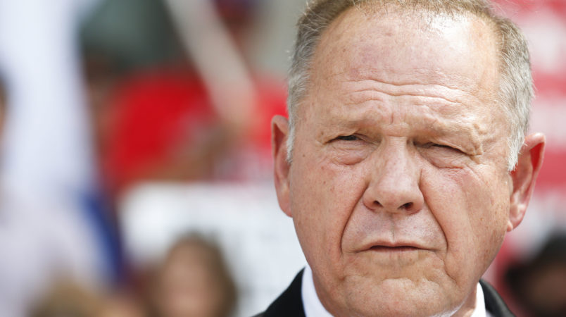 Alabama Chief Justice Roy Moore speaks to the media during a press conference, Monday, Aug. 8, 2016, in Montgomery, Ala. The chief justice continues to fight against gay marriage in Alabama. Moore has been suspended from office after the Judicial Inquiry Commission accused him of violating the canons of judicial ethics with his actions during the fight over same-sex marriage. Moore will attend a hearing Monday that will determine the course of the judicial ethics case against the suspended Alabama Chief Justice. (AP Photo/Brynn Anderson)