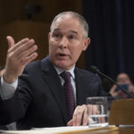Environmental Protection Agency Administrator-designate, Oklahoma Attorney General Scott Pruitt testifies on Capitol Hill in Washington, Wednesday, Jan. 18, 2017, at his confirmation hearing before the Senate Environment and Public Works Committee. (AP Photo/J. Scott Applewhite)