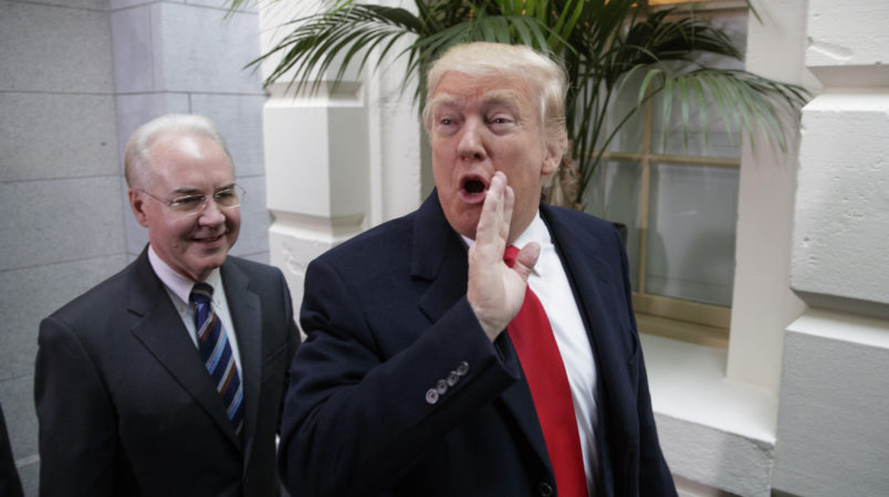 President Donald Trump, joined by Health and Human Services Secretary Tom Price, arrives at the Capitol to rally support for the Republican health care overhaul by taking his case directly to GOP lawmakers two days before the House plans a climactic vote that poses an important early test for his presidency, in Washington, Tuesday, March 21, 2017. (AP Photo/J. Scott Applewhite)