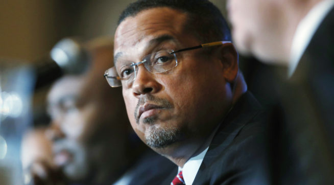 FILE - In a Dec. 2, 2016 file photo, U.S. Rep. Keith Ellison, D-Minn., listens during a forum on the future of the Democratic Party, in Denver. Ellison, who is currently running to be the next chair of the Democratic National Committee, announced Monday, Jan. 16, 2017, he is boycotting Donald Trump's presidential inauguration on Friday. (AP Photo/David Zalubowski, File)