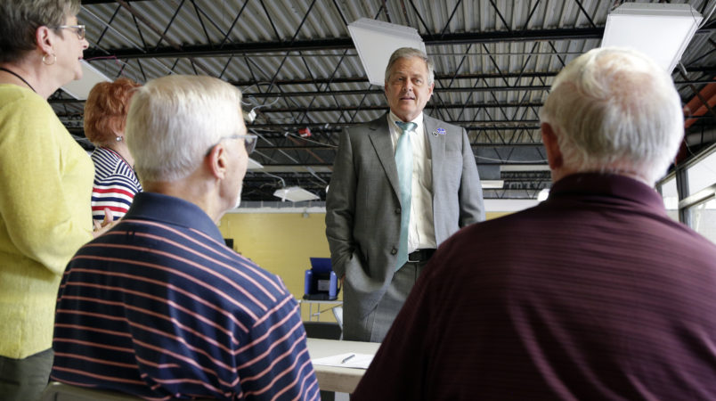 Rep. from SC displays gun at a meeting with constituents