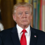 President Donald Trump stands as he waits to bestow the nation's highest military honor, the Medal of Honor to retired Army medic James McCloughan during a ceremony in the East Room of the White House in Washington, Monday, July 31, 2017. McCloughan is credited with saving the lives of members of his platoon nearly 50 years ago in the Battle of Nui Yon Hill in Vietnam. (AP Photo/Pablo Martinez Monsivais)