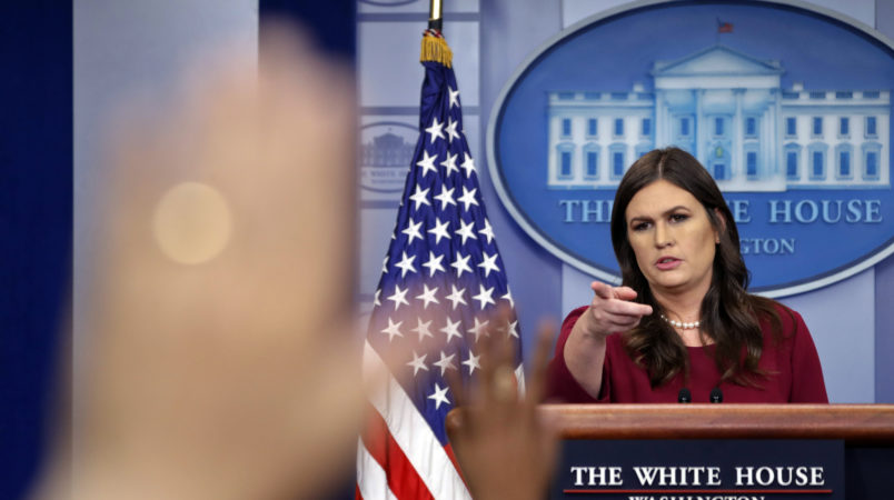 White House press secretary Sarah Huckabee Sanders points as she begins to take questions from the media during the daily briefing in the Brady Press Briefing Room of the White House, Thursday, Oct. 5, 2017. (AP Photo/Pablo Martinez Monsivais)