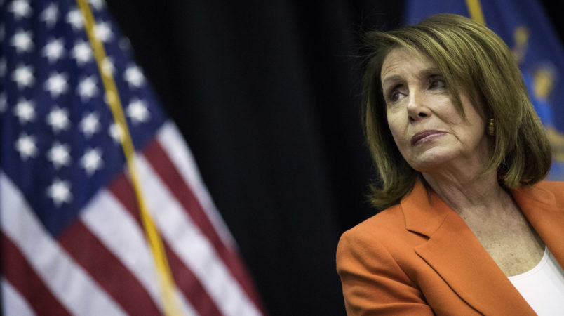 NEW YORK, NY - MAY 1: House Minority Leader Nancy Pelosi (D-CA) looks on during a bill signing event at John Jay College, May 1, 2018 in New York City. New York Governor Andrew Cuomo signed a bill ensuring domestic abusers are prohibited from possessing handguns and long guns in New York State. The bill also prohibits anyone with an outstanding warrant, felony, or other serious offenses from receiving or renewing a firearm license. (Photo by Drew Angerer/Getty Images)